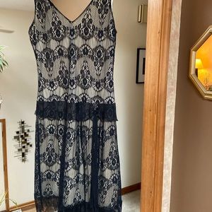 Formal black and creme fringe dress